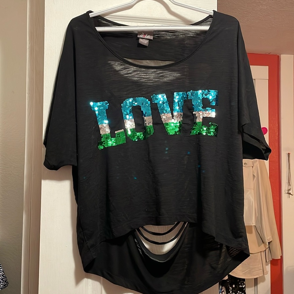 Edgy, black cut T-shirt with the word “love “written in sequins. 1x